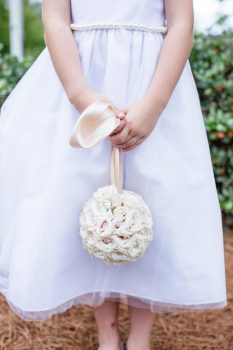 flower girl kissing ball in blush and ivory